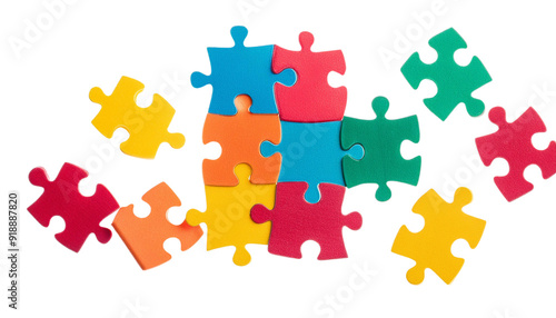 Colorful puzzle pieces scattered on a white background, perfect for representing education, problem-solving, and teamwork concepts.