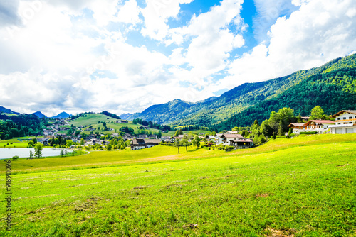 Landscape near Thiersee in Tyrol. Nature by the lake with meadows and mountains. 