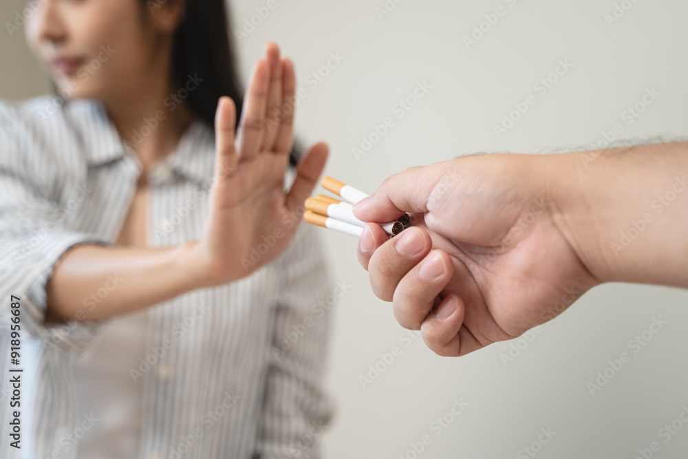 person showing hand sign to rejection cigarette for quit smoke motivation. person showing hand sign to rejection cigarette for quit smoke motivation.