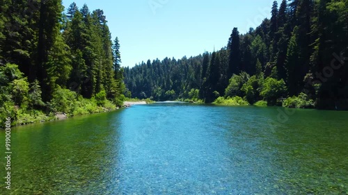 Drone over rocky emerald water photo