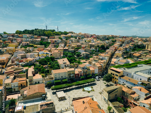 Aerial view of little town of Sant'Antioco houses at sunrise in italy photo