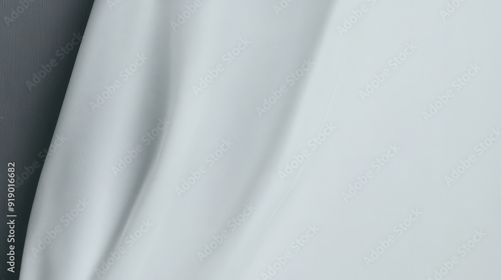 A minimalistic background featuring a smooth white fabric with subtle texturing blends. This clean design highlights simplicity and elegance, perfect for varied uses. A minimalistic background featuring a smooth white fabric with subtle texturing blends. This clean design highlights simplicity and elegance, perfect for varied uses.