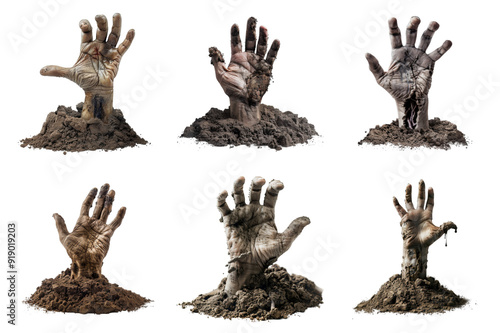 Six Muddy Zombie Hands Reaching From the Ground photo