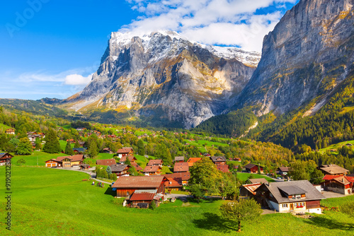 Grindelwald, Switzerland village and mountains view photo