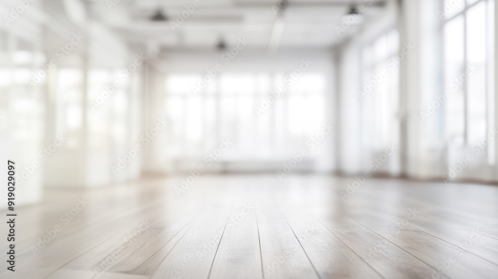 A serene and bright empty office space with large windows and a wooden floor, evoking calm and potential for creativity and new beginnings. A serene and bright empty office space with large windows and a wooden floor, evoking calm and potential for creativity and new beginnings.
