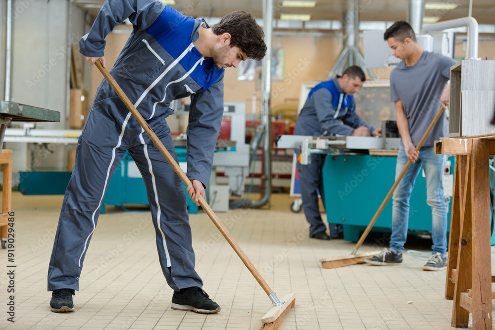 group of workers cleaning factory group of workers cleaning factory