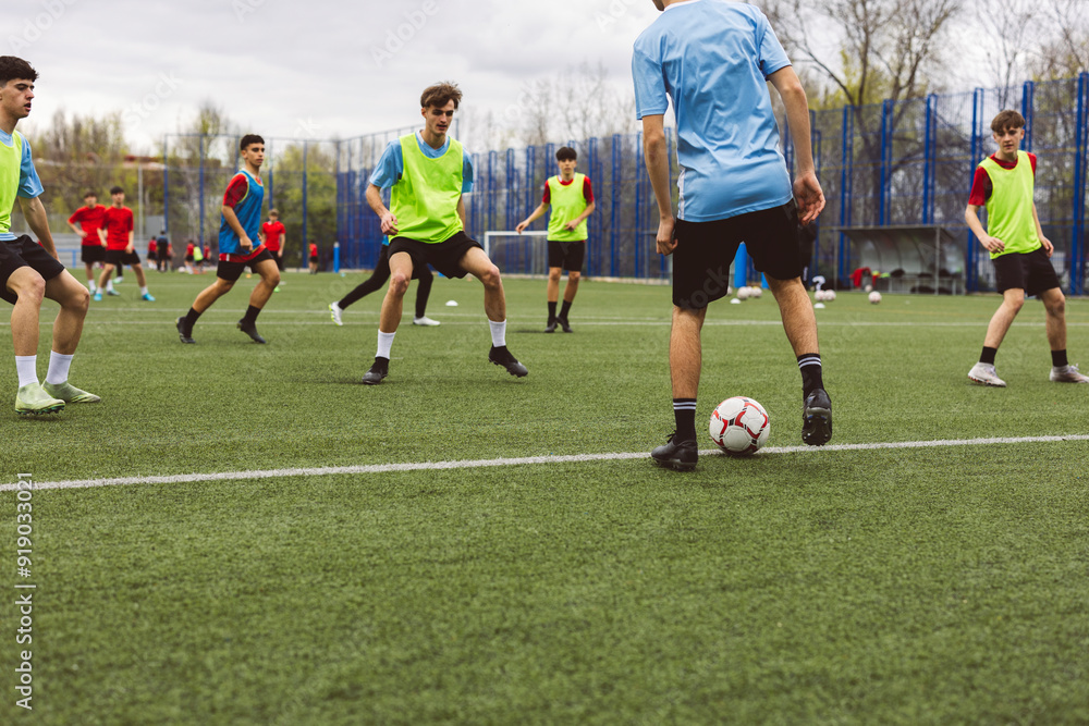 Soccer players having match on field Soccer players having match on field