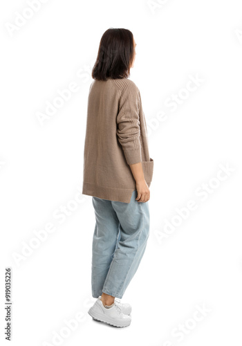 фотографія Mature woman in casual clothes on white background, back view