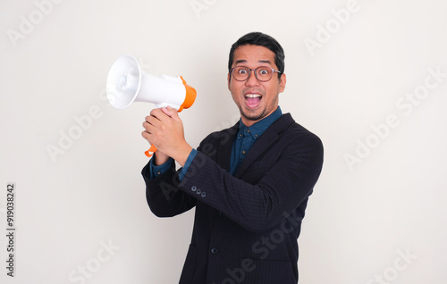 A leader showing wow face expression while holding megaphone photo