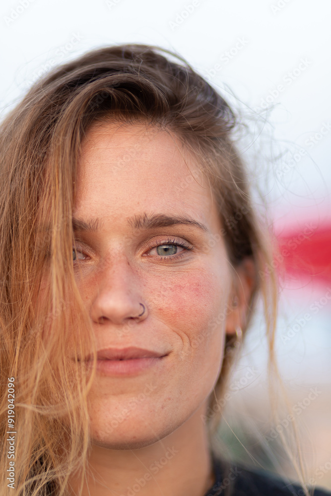 Charming woman standing looking at camera Charming woman standing looking at camera