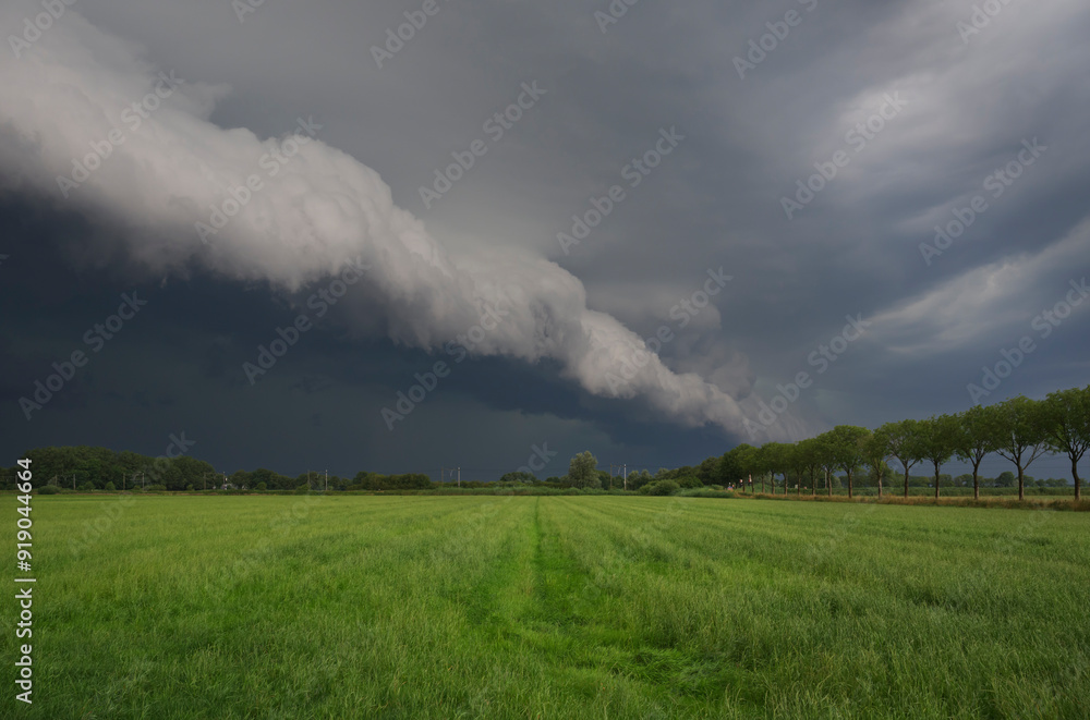 Arcus cloud on agricultural field Arcus cloud on agricultural field