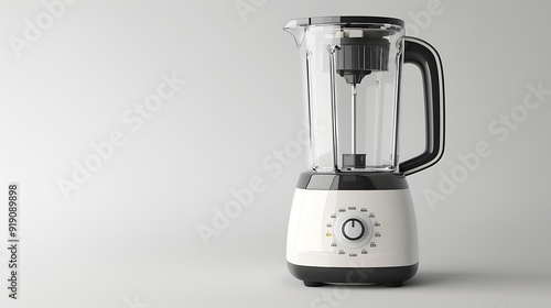 A modern electric blender with a clear pitcher on a white background. photo