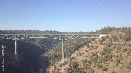 Slow Descending shot capturing Foresthill Bridge in Auburn California. photo