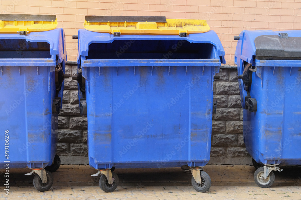 Garbage bins in city. Dustbins being full with garbage. Garbage is pile lots dump. Garbage bins in city. Dustbins being full with garbage. Garbage is pile lots dump.