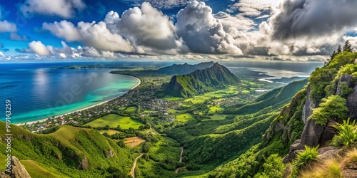 Breathtaking panorama of windward Oahu from the precipice of Nuuanu Pali, a 1200-foot cliff in the Ko'olau Range, showcases Hawaii's lush coastline and ocean views. photo