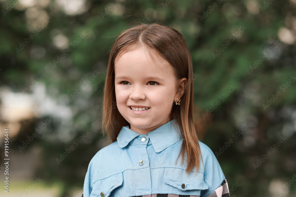 Portrait of happy little girl outdoors. Cute child Portrait of happy little girl outdoors. Cute child