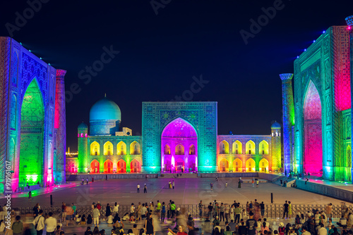 Light show on the facades of the madrasahs of Registan Square. photo