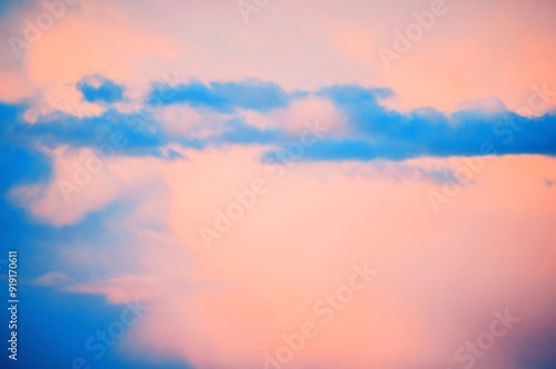 Sunset sky background with pink and blue dramatic colorful clouds