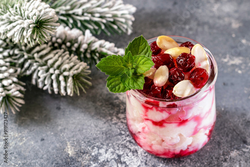 Risalamande is a traditional Danish Christmas dessert, cold rice pudding with whipped cream and almonds. Served with hot cherry sauce.