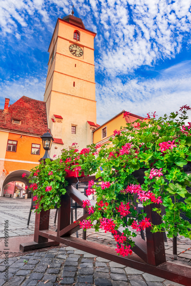 Sibiu, Romania. Cityscape with Council Tower, morning summer light, beautiful city in Transylvania.