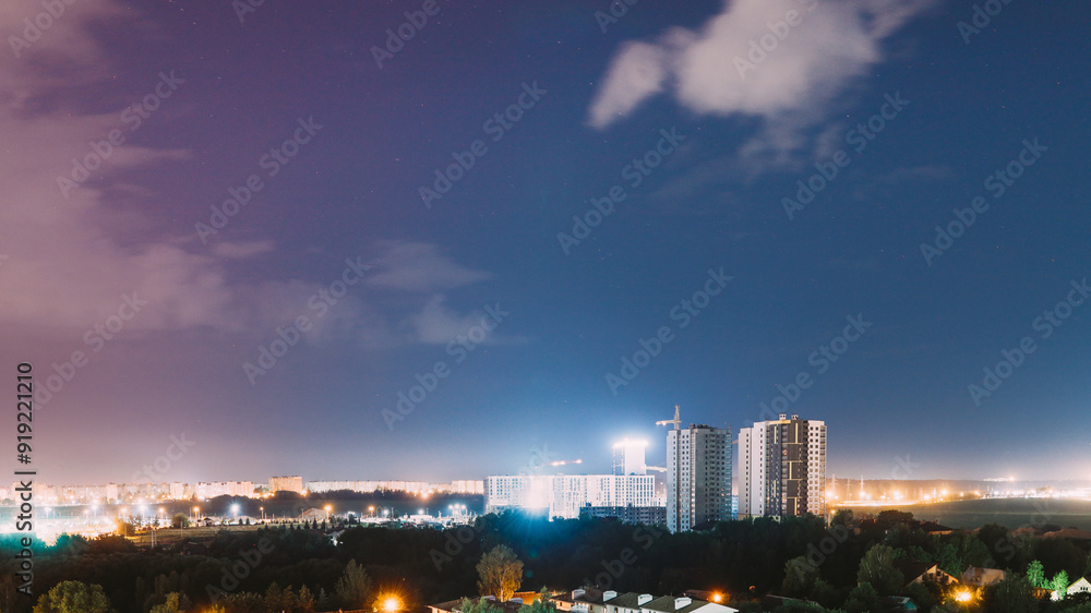 night works with construction site area. Development Multistorey Residential Building in night hours. development on construction site. night time work. Construction And Development Of Modern Multi night works with construction site area. Development Multistorey Residential Building in night hours. development on construction site. night time work. Construction And Development Of Modern Multi