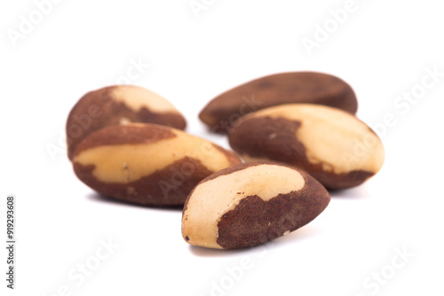 Brazil nuts over white background. Top view. Healthy food concept.