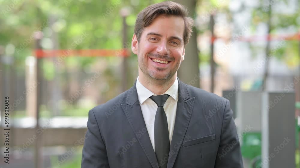 Portrait of Smiling Young Businessman Outdoor Portrait of Smiling Young Businessman Outdoor