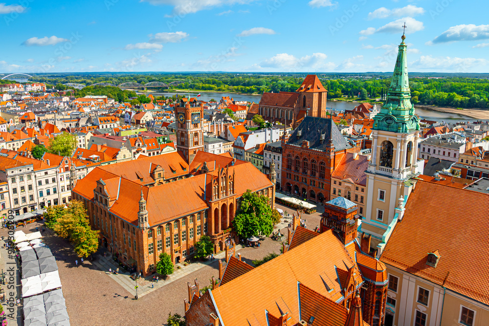 Aerial panoramic view of historical buildings and roofs in Polish medieval town Torun