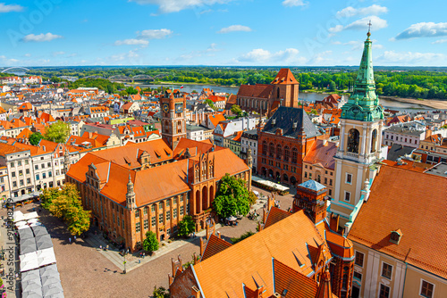 Obraz na płótnie Aerial panoramic view of historical buildings and roofs in Polish medieval town Torun w salonie
