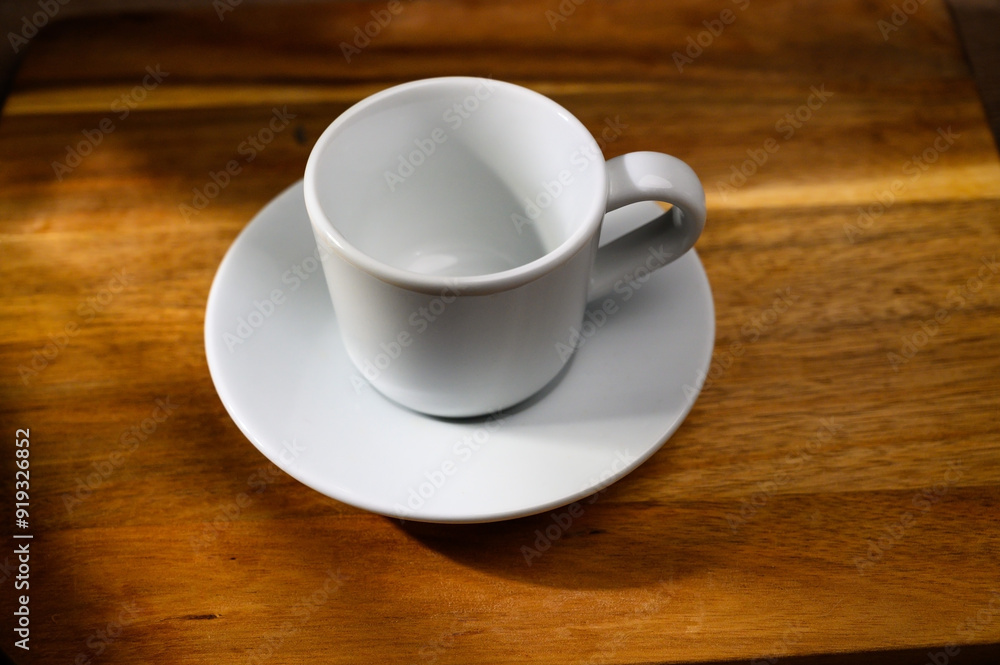 view of a coffee cup on a wooden table with a beautiful wood view of a coffee cup on a wooden table with a beautiful wood