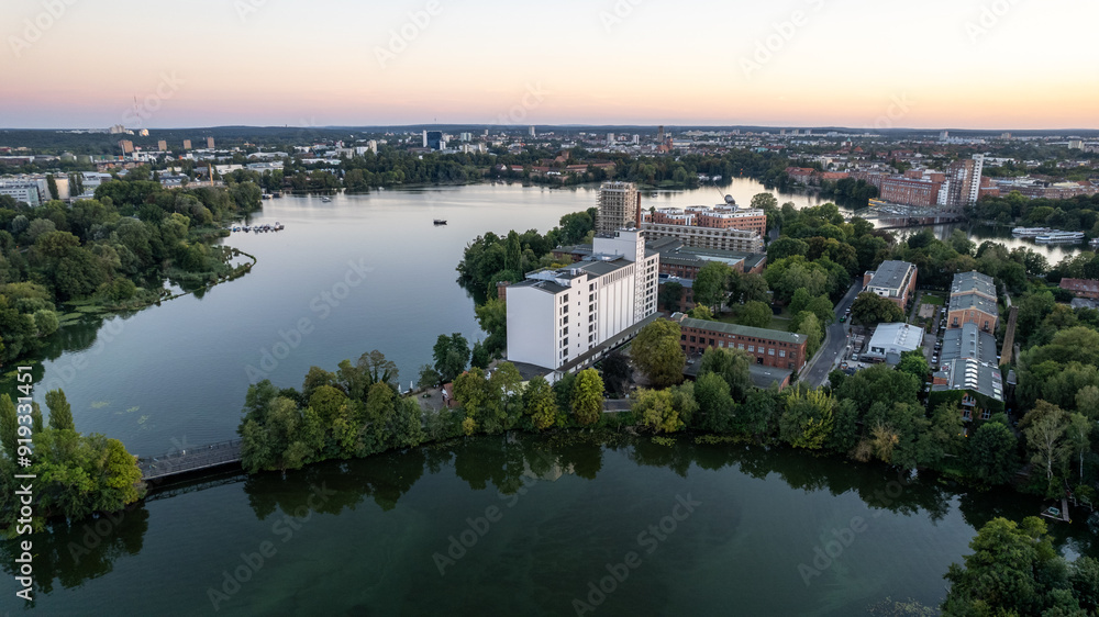 drone aerial view over Spandau Berlin in Germany over river HAvel on a sunny summer evening with sunset