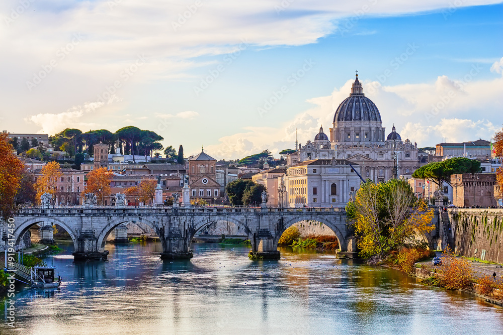 Fototapeta premium Beautiful autumn image of St. Peter's Basilica, Ponte Sant Angelo and Tiber River at dusk in Rome, Italy.