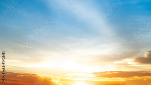 Beautiful , luxury soft gradient orange gold clouds and sunlight on the blue sky perfect for the background, take in everning,Twilight, Large size, high definition landscape photo