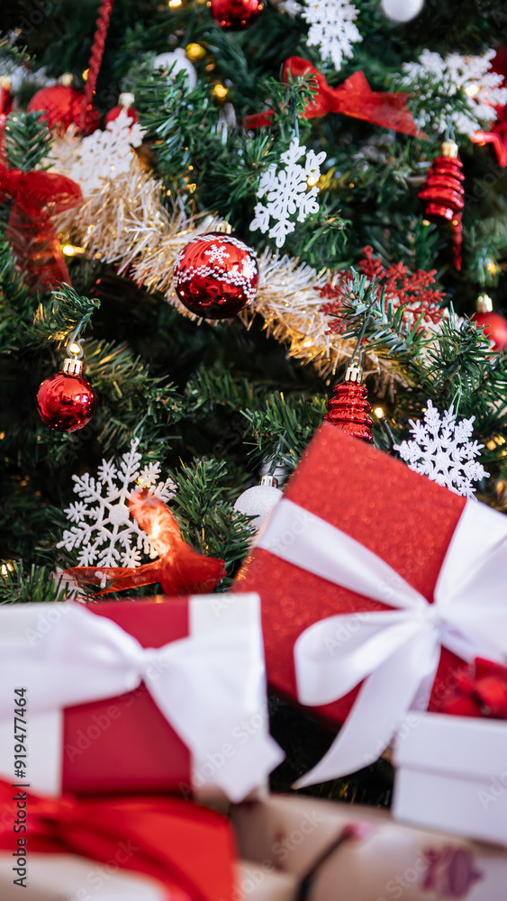 Under a modern Christmas tree, elegantly wrapped gift boxes, holiday Xmas Under a modern Christmas tree, elegantly wrapped gift boxes, holiday Xmas