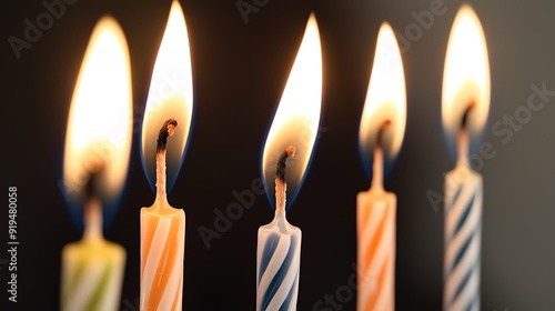 Artistic close-up of birthday candles being blown out photo