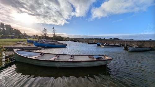 Obraz na płótnie Old wooden fishing boats in Corrib lake at Annaghdown pier, county Galway, Ireland, nature background w salonie
