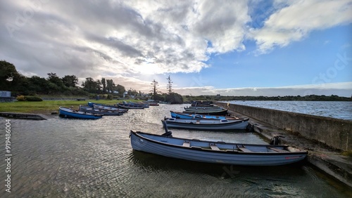 Obraz na płótnie Old wooden fishing boats in Corrib lake at Annaghdown pier, county Galway, Ireland, nature background w salonie
