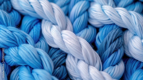 Abstract background of hand knitted yarn in blue and white shades