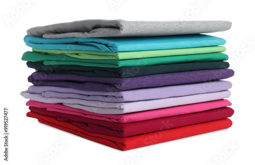 Stack of clean colorful t-shirts isolated on white