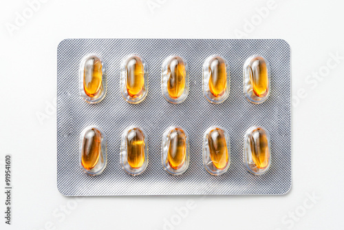 Oil filled blister pack capsules, softgel of food supplements, fish oil, omega 3, vitamin DHA photo