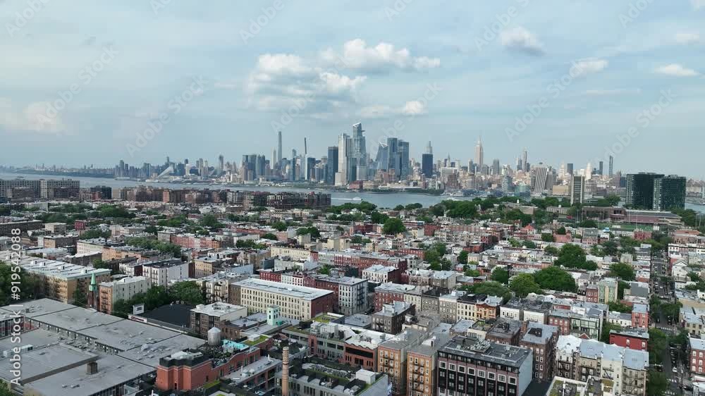 Aerial View of Hoboken downtown and Manhattan Skyline on the background. Aerial View of Hoboken downtown and Manhattan Skyline on the background.