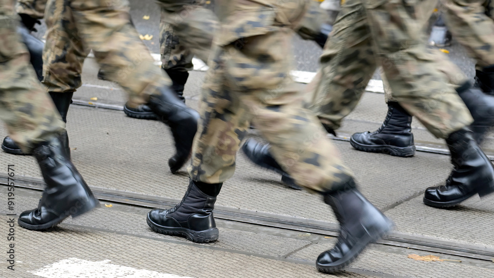 Anonymous army soldiers marching through the street in generic camo uniforms and black boots, generic dynamic news shot, group of people, closeup, motion, infantry operations movement, army parade Anonymous army soldiers marching through the street in generic camo uniforms and black boots, generic dynamic news shot, group of people, closeup, motion, infantry operations movement, army parade