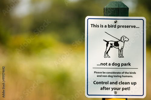 Bird preserve sign alerting visitors that it isn't a dog park within Forest Beach Migratory Preserve, Belgium, Wisconsin photo