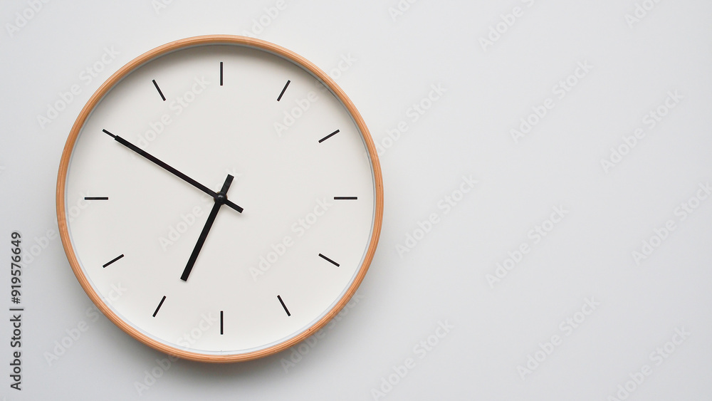 Minimalist wooden Wall Clock on White Wooden Surface with Space for Text – Time Set at 18.50/06.50 Minimalist wooden Wall Clock on White Wooden Surface with Space for Text – Time Set at 18.50/06.50