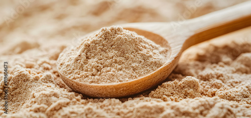 Close-up of Protein Powder on Beige Background