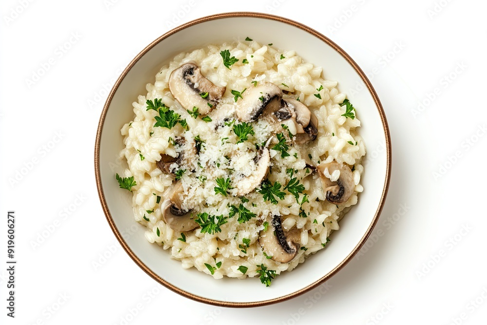 Mushroom risotto with parmesan and parsley isolated on a white, top view Mushroom risotto with parmesan and parsley isolated on a white, top view