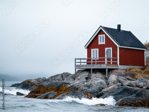 A fisherman s hut on a rocky shore, with waves crashing against the rocks