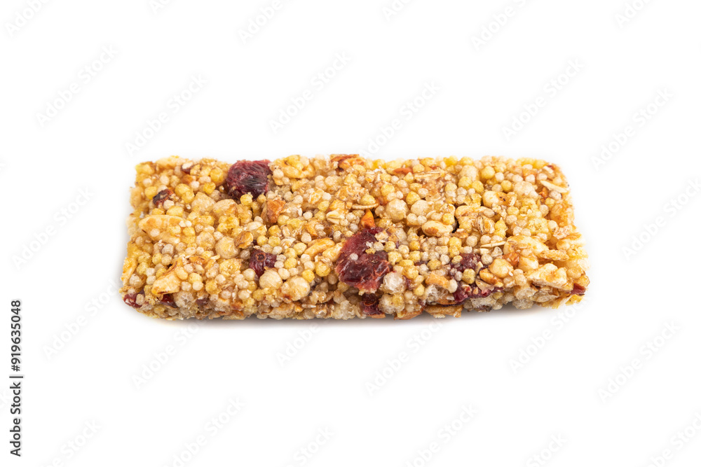 Granola bar with, caramel, nuts, flakes isolated on white. Side view, close up. Granola bar with, caramel, nuts, flakes isolated on white. Side view, close up.