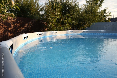 Above ground swimming pool outdoors on sunny day, closeup