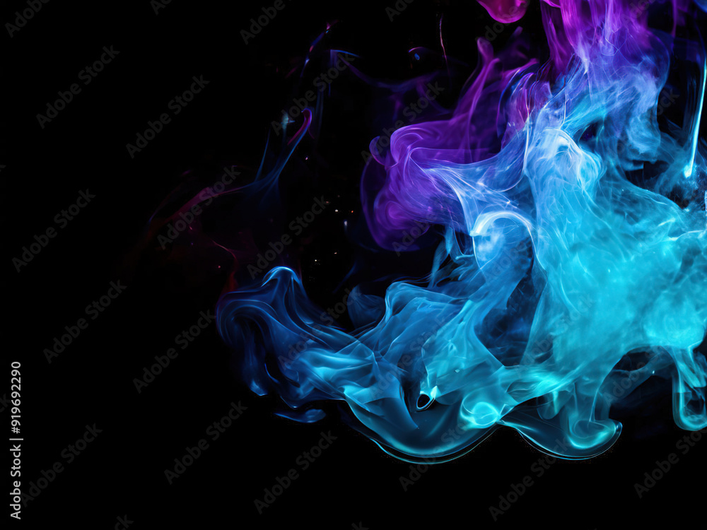 Fototapeta premium Abstract blue and purple smoke swirls on black background.